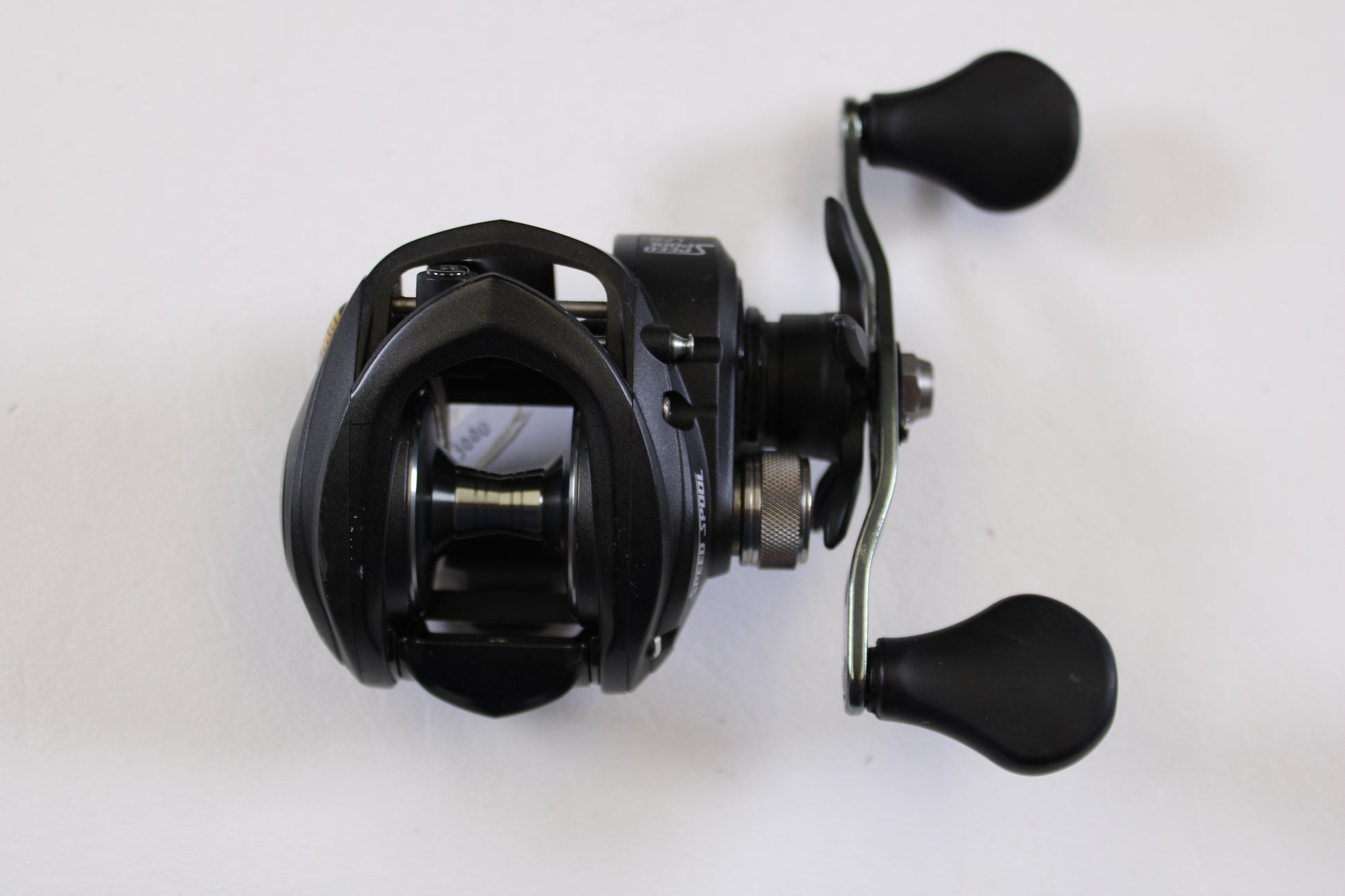 A Lew's Speed Spool SS1SA 5.6:1 RH Used Casting Reel in very good condition is displayed from above on a white background—an ideal choice for the Rod and Reel Trade-In Program if you're upgrading your fishing gear.