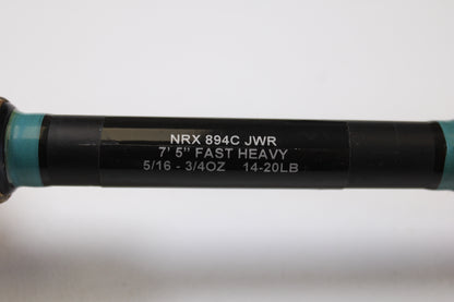 Close-up of a G. Loomis NRX 894c JWR 7'5" Heavy Used Casting Rod in excellent condition showing specs: "7'5'' Fast Heavy, 5/16-3/4 OZ, 14-20 LB" in white on black. Ask about our trade-in program for store credit!.