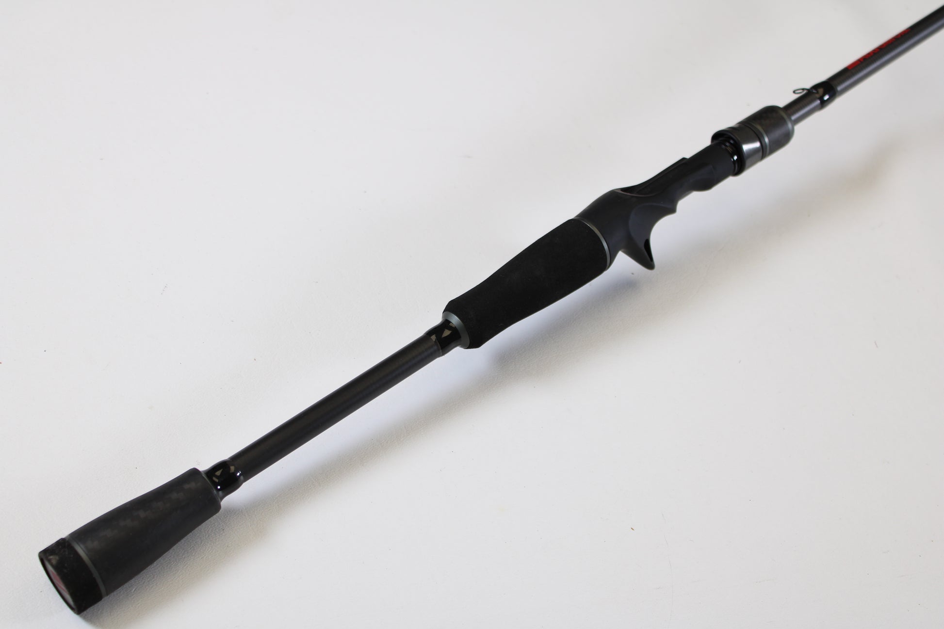 A used Abu Garcia Fantasista FNXC70-6 7'0" Medium Heavy casting rod in excellent condition, featuring a foam handle and trigger grip. Trade in your old gear for store credit through our rod and reel trade-in program today.