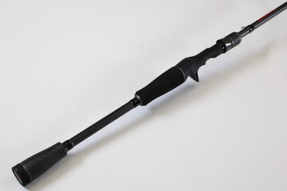 A used Abu Garcia Fantasista FNXC70-6 7'0" Medium Heavy casting rod in excellent condition, featuring a foam handle and trigger grip. Trade in your old gear for store credit through our rod and reel trade-in program today.