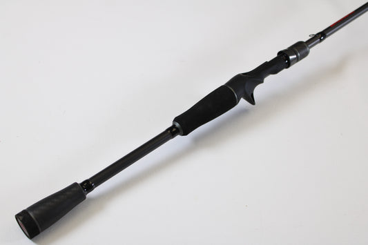 A used Abu Garcia Fantasista FNXC70-6 7'0" Medium Heavy casting rod in excellent condition, featuring a foam handle and trigger grip. Trade in your old gear for store credit through our rod and reel trade-in program today.