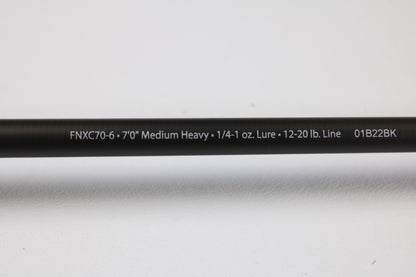 A close-up of the Abu Garcia Fantasista FNXC70-6 7'0" Medium Heavy Used Casting Rod in excellent condition, shown against a white background, perfect for upgrading your gear or trading in your current rod and reel.