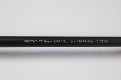 A close-up of the Abu Garcia Fantasista FNXC73-7 7'3" Heavy Used Casting Rod in excellent condition, with specs printed in white—perfect for the Rod and Reel Trade-In Program or earning store credit with your used Abu Garcia gear.