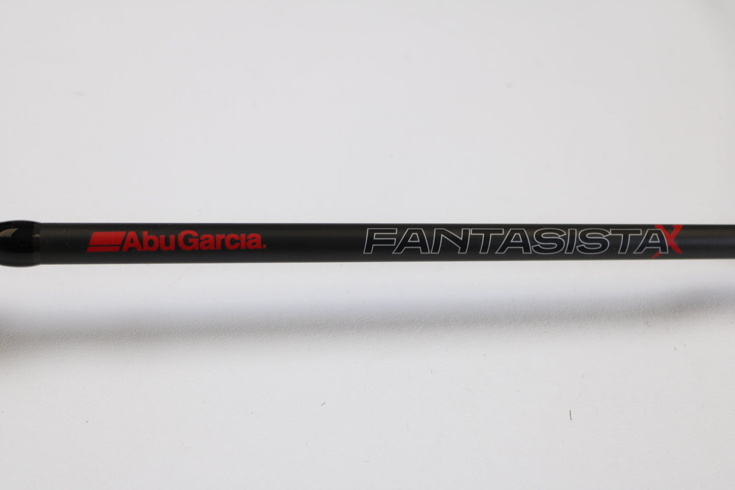 A close-up of the Abu Garcia Fantasista FNXC73-7 7'3" Heavy Used Casting Rod in excellent condition—ideal for anglers upgrading with our Rod and Reel Trade-In Program.