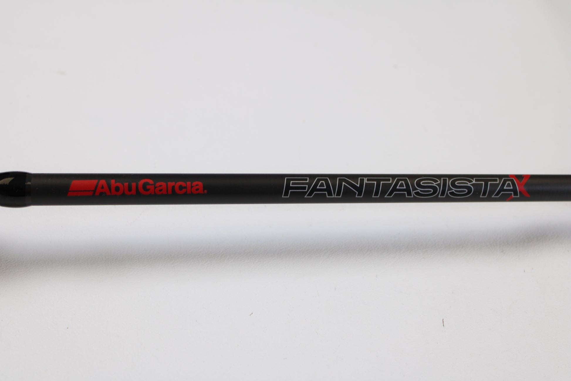 A close-up of the Abu Garcia Fantasista FNXC73-7 7'3" Heavy Used Casting Rod in excellent condition—ideal for anglers upgrading with our Rod and Reel Trade-In Program.