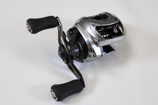 A close-up of a Daiwa Zillion ZLNSVG100 6.3:1 RH used casting reel in excellent condition—perfect for our rod and reel trade-in program. Trade in your old gear and earn store credit with this top-quality Daiwa reel!.