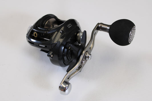 A close-up of the Daiwa Lexa 300 LX 300HL-P 7.4:1 LH Used Casting Reel in excellent condition—ideal for those seeking quality used Daiwa gear or trading in equipment for store credit with our Rod and Reel Trade-In Program.