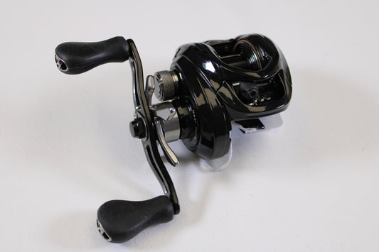 A close-up of a Florida Fishing Products Bahia BC 150 7.2:1 RH used spinning reel in excellent condition, featuring ergonomic handles—ideal for those exploring our rod and reel trade-in program for used gear.