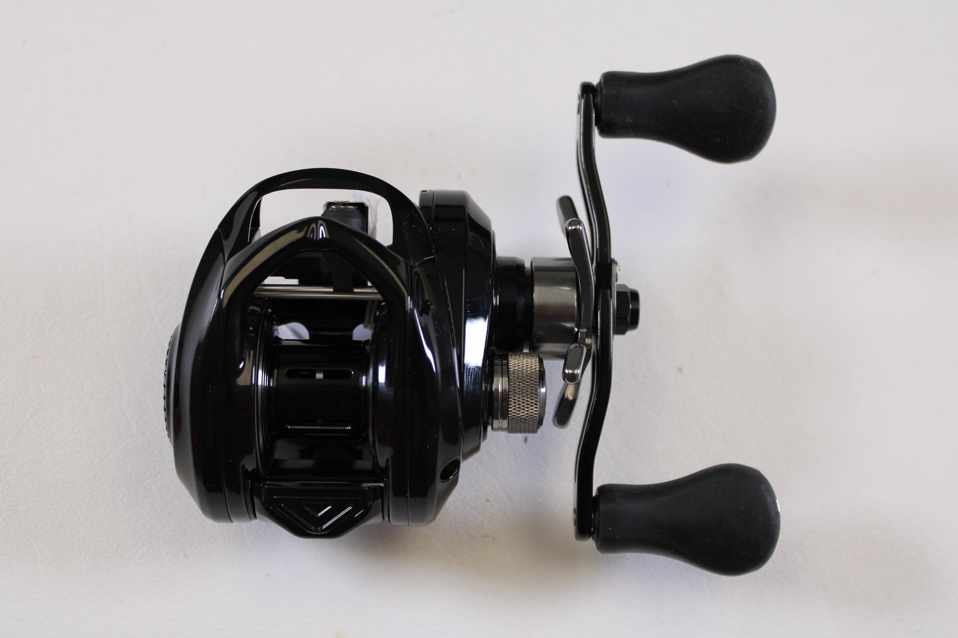 The Florida Fishing Products Bahia BC 150 7.2:1 RH—Used Spinning Reel in excellent condition, shown from above on a white background, is eligible for our Rod and Reel Trade-In program when you upgrade to new or used gear.