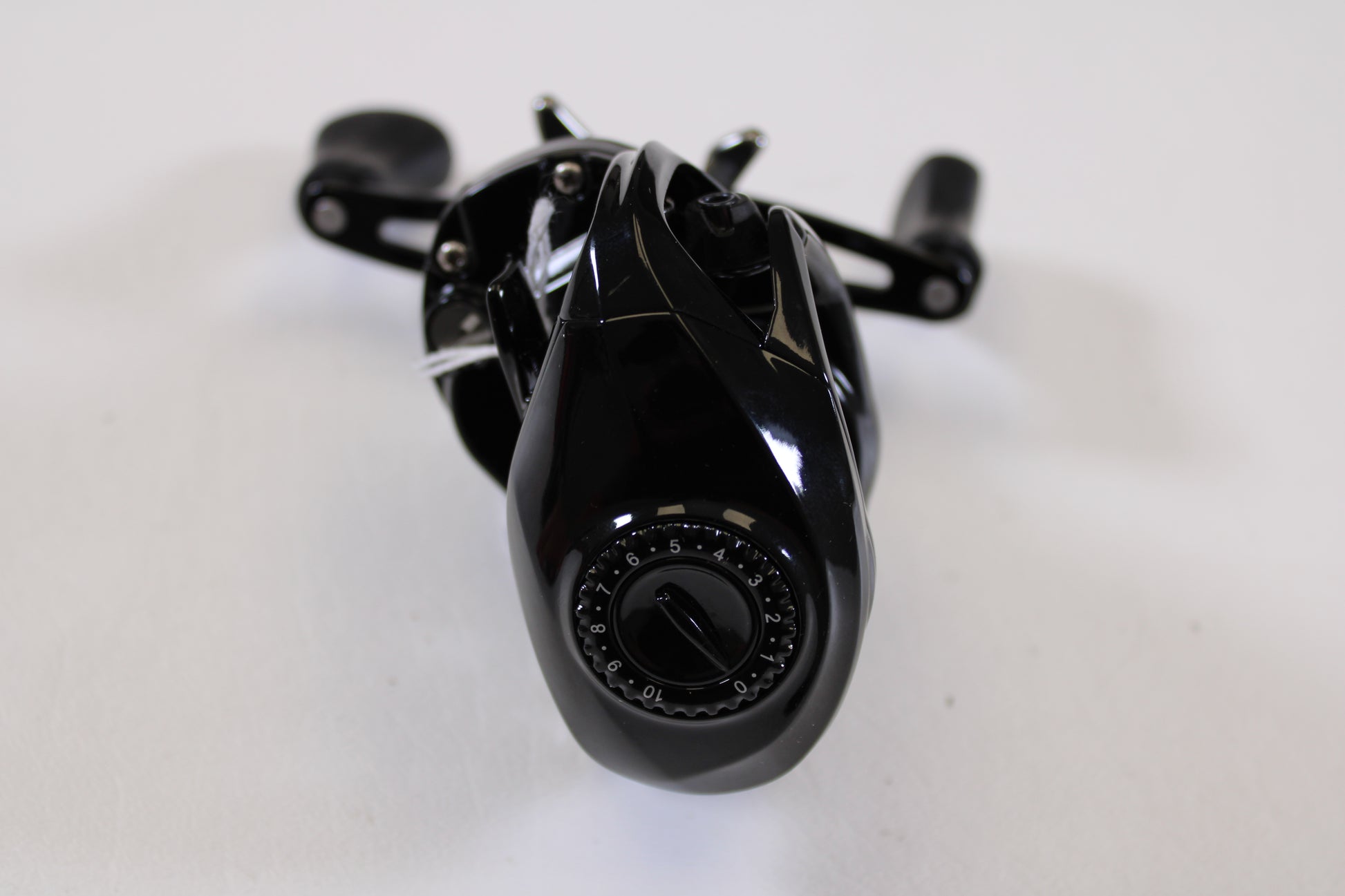 A close-up of the Florida Fishing Products Bahia BC 150 7.2:1 RH spinning reel in excellent used condition on a white background—ideal for our rod and reel trade-in program to help you upgrade and earn store credit.