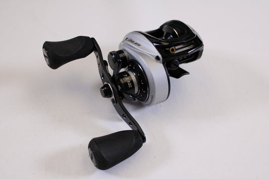 A close-up of an Abu Garcia Revo STX Gen 4 REVO3STX-HS 7.3:1 RH used casting reel in excellent condition—ideal for anyone interested in our rod and reel trade-in program.