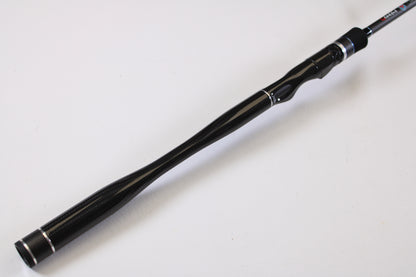 A close-up of the ODM Rods Genesis Inshore BXGX 761MS 7'6" Medium Used Spinning Rod handle, featuring an ergonomic grip, ideal for our rod and reel trade-in program, shown against a plain white background.