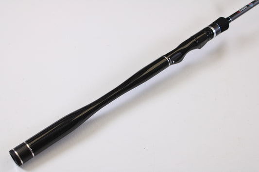A close-up of the ODM Rods Genesis Inshore BXGX 761MS 7'6" Medium Used Spinning Rod handle, featuring an ergonomic grip, ideal for our rod and reel trade-in program, shown against a plain white background.