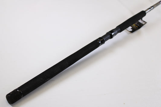 A close-up of the St. Croix Mojo Musky Trolling MMT80HM 8'0" Heavy Used Casting Rod handle—mint condition—shows the grip and reel seat, ideal for anyone exploring our Rod and Reel Trade-In Program to upgrade their gear.
