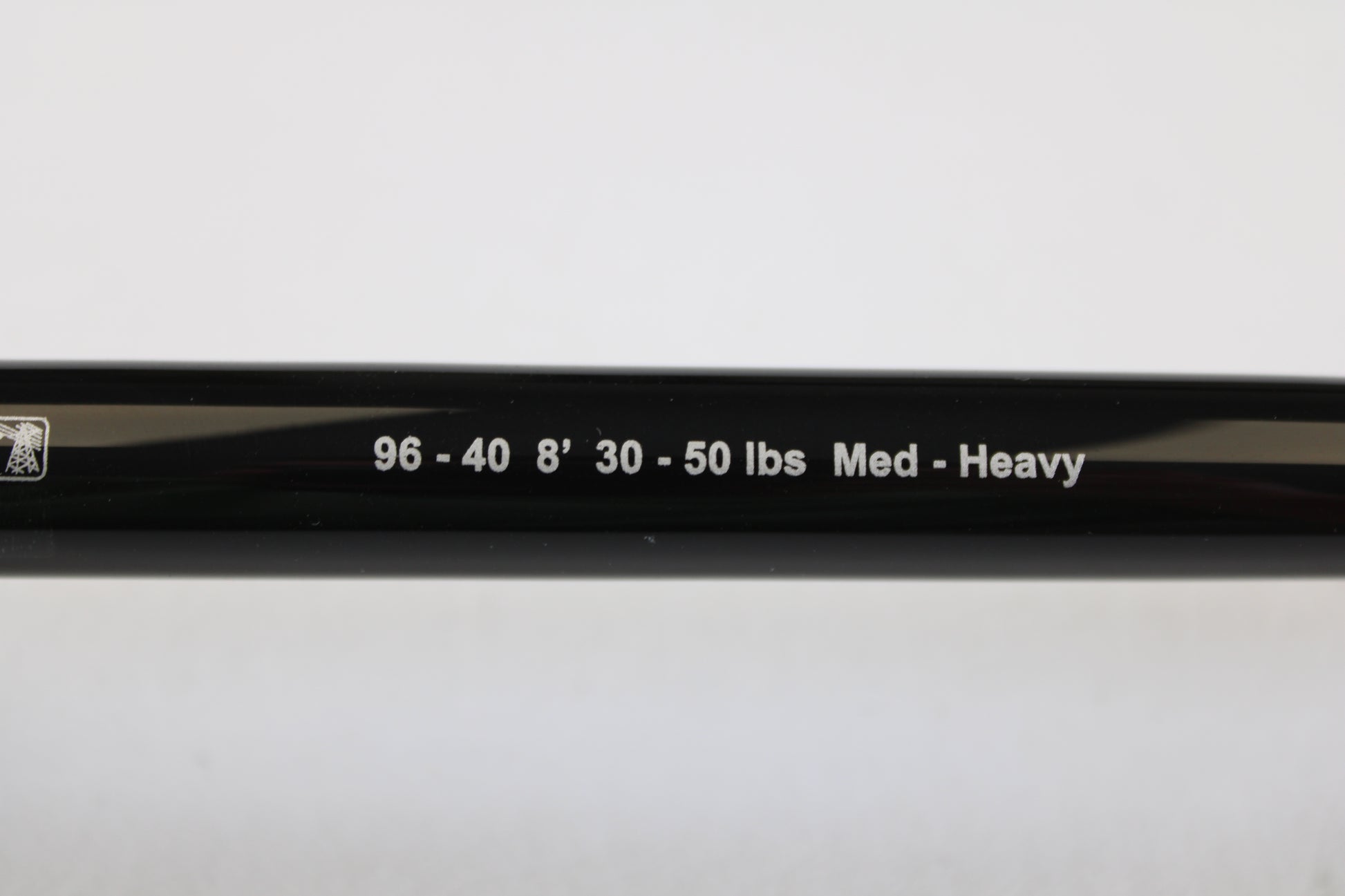 Close-up of a G. Loomis IMX-PRO Offshore 96-40 8'0" Medium Heavy Used Casting Rod in mint condition, ideal for those interested in store credit through our rod and reel trade-in program or seeking top-quality used gear.