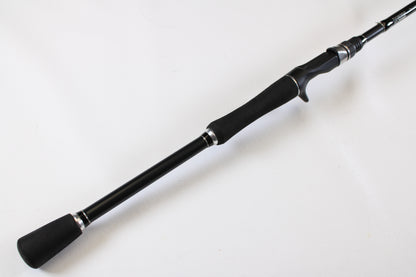 A close-up of the Fitzgerald Original TLR710H The Ledge Rod 7'10" Heavy, a used casting rod in very good condition with foam grips and reel seat—ideal for our Rod and Reel Trade-In Program if you want to upgrade for store credit.