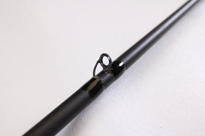 Close-up of the 13 Fishing Muse 7'6" Medium Heavy Used Casting Rod in excellent condition, highlighting a line guide—ideal for anyone considering used gear or our rod and reel trade-in program for store credit.