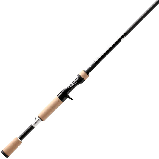 The 13 Fishing Omen Black 3 Casting Rod 8'0" XH | OB3C8XH features cork handles and a baitcasting reel seat, shown diagonally on a white background to emphasize its lightweight, ergonomic extra heavy design.