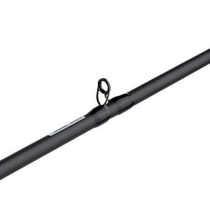 A close-up of a black fishing rod segment showing the guide ring. The Abu Garcia Veritas Tournament Casting Rod 7'3" Medium Heavy model VXTC73-6 flaunts a sleek design with a smooth matte finish, enhanced by Powerlux 200 resin technology for superior performance.