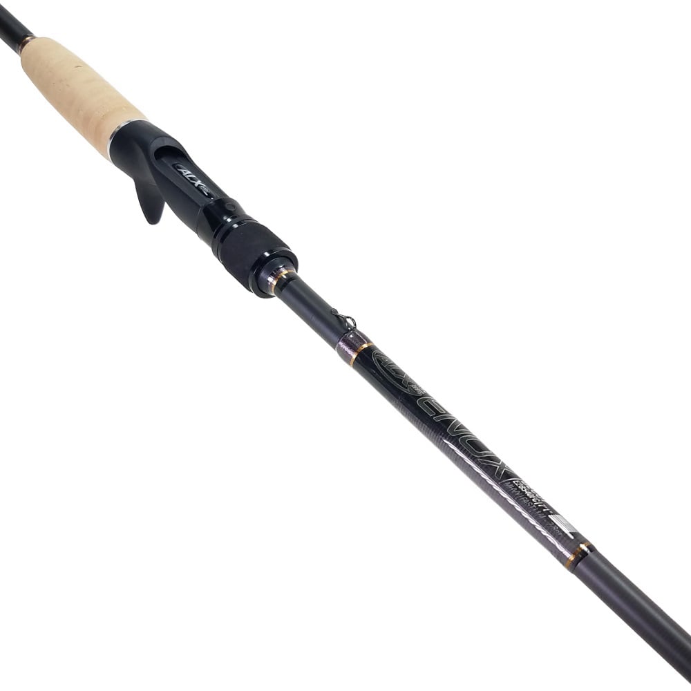 Close-up of the ALX ENOX Casting Rod BMJ 7'2" Medium Heavy+ handle and reel seat. The rod features a wooden grip, sleek black design with silver accents, and is made from 1100T Toray carbon fiber for enhanced performance and durability.