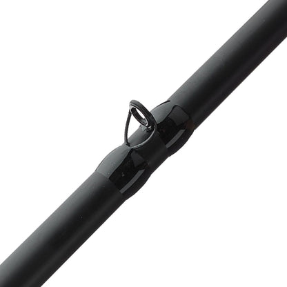A detailed close-up of the ALX IKOS Casting Rod Promise 7 7'0" Medium Heavy | IC84F4 features a precisely designed guide ring on its sleek surface, enhancing line control for bass fishing. The image highlights this advanced rod's craftsmanship.