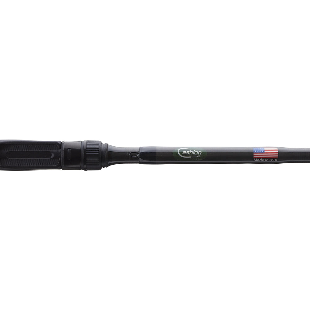 Close-up of a black handle on the Cashion ICON Series Crankbait Casting Rod 7'0" Medium Heavy, featuring the "Fashion" logo, small American flag sticker, and "Made in USA" text—proudly showcasing a quality American-made rod from Cashion.