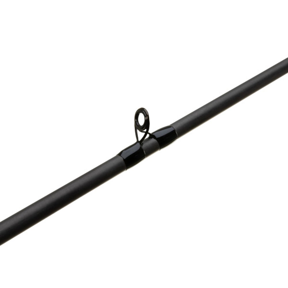 Close-up of a G. Loomis GCX Flip Punch Casting Rod 894C FPR 7'5" Heavy from americanlegacyfishing, highlighting a black eyelet. The dark gray cylindrical design with Multi-Taper ensures precision for bass anglers, with the eyelet guiding the line effortlessly on a white background.