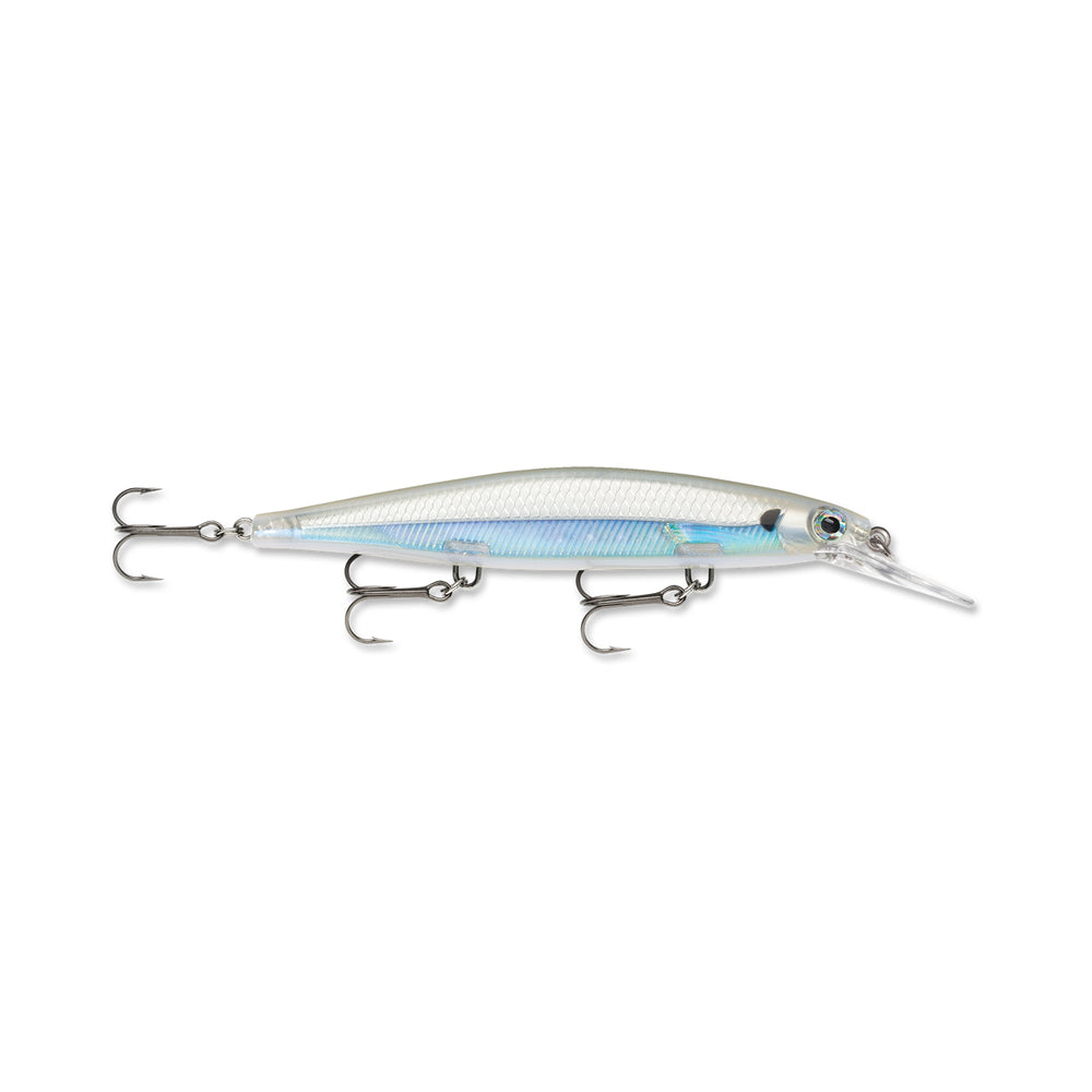 The Rapala Shadow Rap Deep Jerkbaits, by Rapala, is silver and blue with an elongated body and features three treble hooks. Its reflective finish and detailed eyes mimic a minnow's action for realistic fishing.