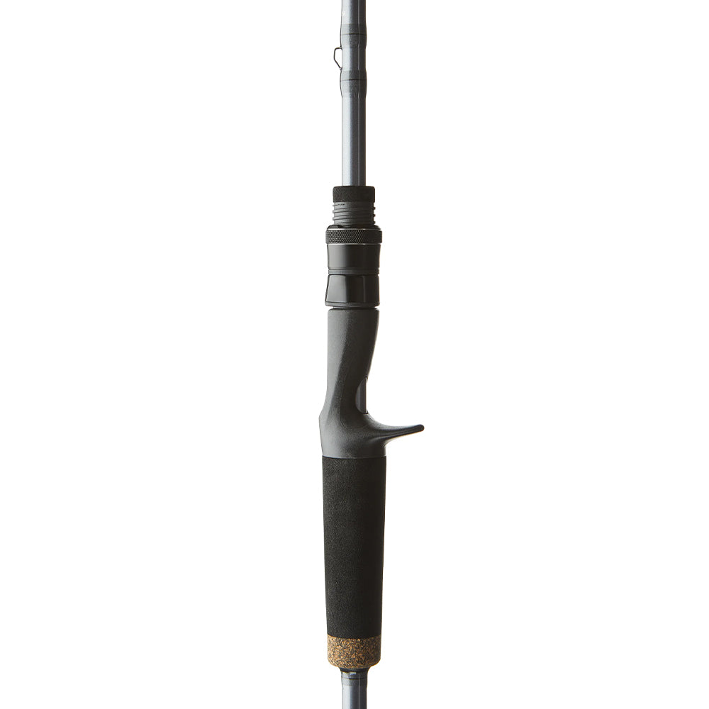 Close-up of a St. Croix Black Bass Casting Rod 7'5" Medium Heavy (RIC75MHF) handle featuring a black grip, trigger-style reel seat, SCIII Carbon Fiber build, and cork accent at the base.