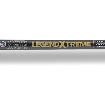 Close-up of the St. Croix Legend Xtreme 7'4" Heavy Casting Rod by americanlegacyfishing, featuring the "Legend Xtreme" label. It offers Heavy capabilities, Advanced Reinforcing Technology, premium SCVI graphite, and is made in the USA with a sleek black design accented by gold and silver details.