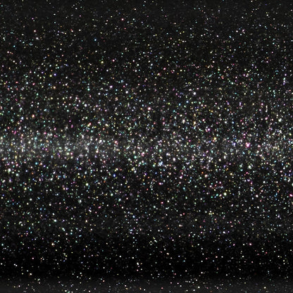 A dark, sparkly texture with colorful specks resembles a starry sky—just as impressive as the St. Croix Legend Xtreme 7'4" Heavy Casting Rod's Advanced Reinforcing Technology from americanlegacyfishing.