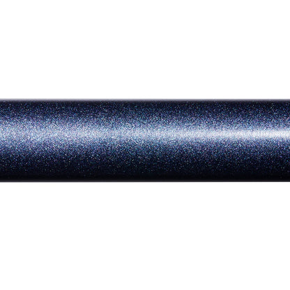 A close-up of the St. Croix Seage Surf Series Spinning Rods 11’0” Medium Heavy 2pc (SES110MHMF2) shows its dark, glittery SCII carbon fiber surface sparkling with blue, silver, and purple flecks.