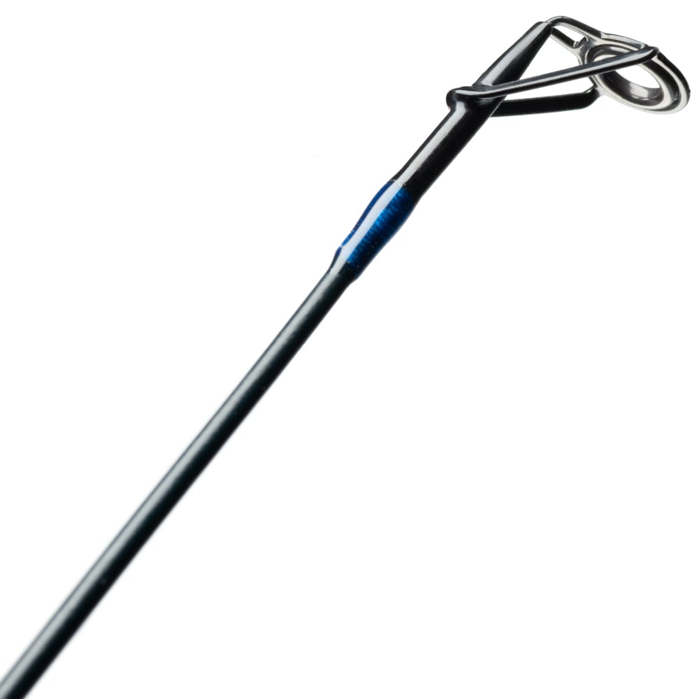 The St. Croix Triumph Travel Spinning Rod 6'6” Medium Heavy (TSR66MHF4) features a close-up of its metal guide loop and blue-accented handle, crafted from SCII Carbon. It's angled diagonally against a white background.