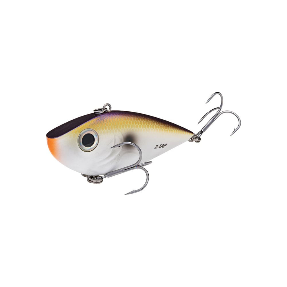 Meet the Strike King Red Eye Shad Tungsten 2 Tap, a lifelike lipless crankbait with a white/orange belly, silver sides, dark back, and large eye. It features two treble hooks to attract your prized catch effortlessly.