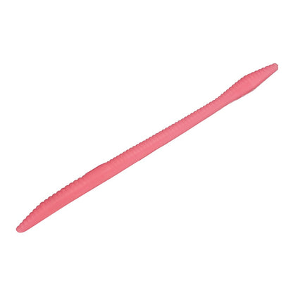 The pink Zoom Trick Worms, with a ribbed texture and tapering ends, effortlessly drift for shallow water bass fishing. Ideal for floating presentations, this soft plastic lure is showcased against a white background.