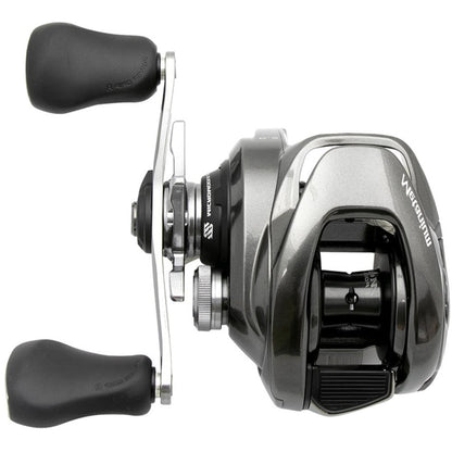 The Shimano Metanium MGL 151HGB 7.1:1 Left Hand Casting Reel from americanlegacyfishing showcases a sleek silver and black design with two black handles and prominent branding. Its compact design features a Magnesium CoreSolid Body with exposed components, highlighting the fine details and craftsmanship of the reel.