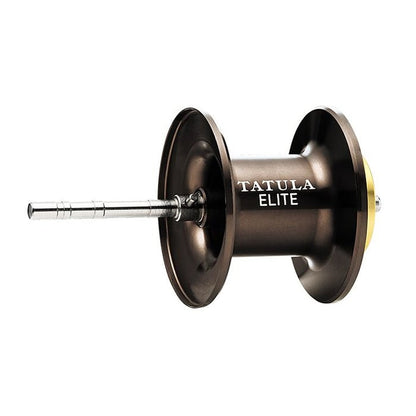 A Daiwa Tatula Elite 100XS 8.1:1 Casting Reel with a bronze spool and a long metal pin for distance casting is set against a plain white background.