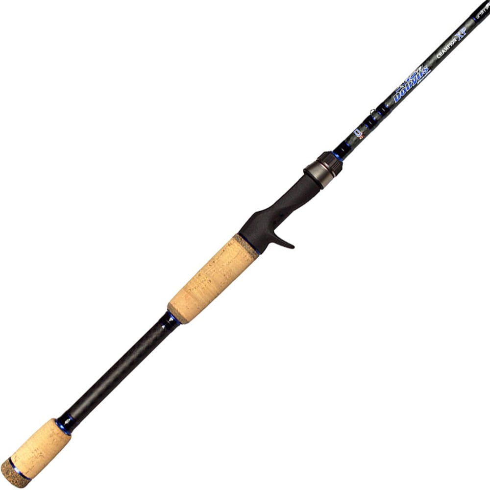 The Dobyns Champion XP 7'3" Medium Heavy Split Grip Casting Rod features a sleek black high modulus graphite shaft with cork handles, a trigger grip, and striking blue accents near the handle for precise casting.