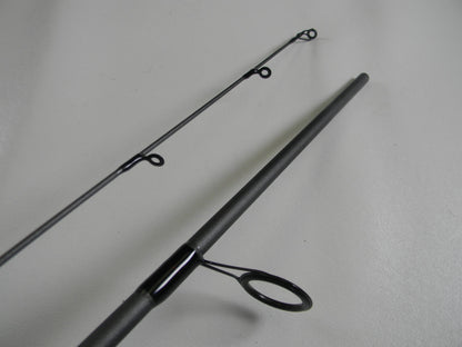 Close-up of a St. Croix X Trek CTCS70MF2-C 7'0" Medium used spinning rod in excellent condition, shown separated to highlight its black line guides and smooth finish—ideal for our Rod and Reel Trade-In Program or store credit.
