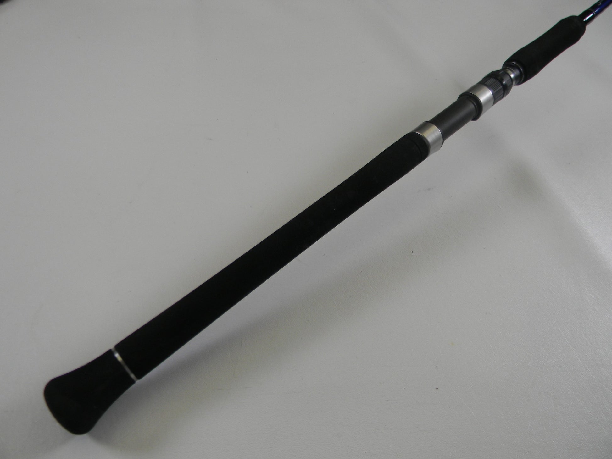 A close-up of the Shimano Grappler Type C GRPCS70L 7'0" Light Used Spinning Rod in excellent condition—ideal for anglers looking to upgrade gear with our Rod and Reel Trade-In Program for store credit.