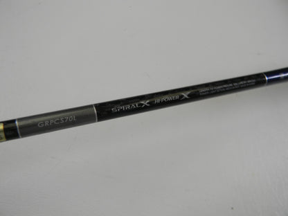 A close-up of a Shimano Grappler Type C GRPCS70L 7'0" Light Used Spinning Rod in excellent condition, showing "GRPCS70L," "SPIRAL X," and "HI-POWER X"—ideal for upgrading with our Rod and Reel Trade-In Program.