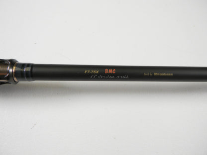 A close-up of a Megabass Destroyer P5 F7-75X BMG 7'5" Heavy Used Casting Rod in excellent condition—ideal for upgrading through our Rod and Reel Trade-In Program.