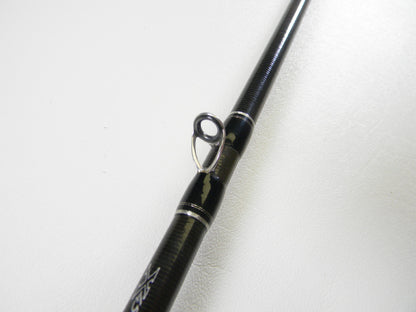 A close-up of the Daiwa Zillion ZIL731MHFB 7'3" Medium Heavy Used Casting Rod in excellent condition showcases its metal line guide—ideal for upgrading your gear through our Rod and Reel Trade-In Program for store credit.