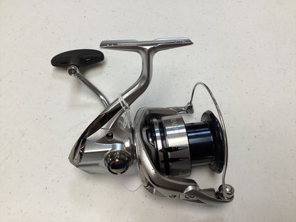 A close-up of the Shimano Stradic FL ST4000XGFL Used Spinning Reel in very good condition, highlighting its handle and spool—an ideal choice for the Rod and Reel Trade-In Program to earn store credit on your used Shimano gear.