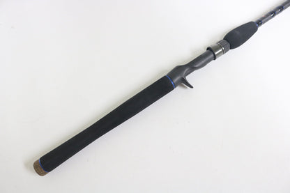 A close-up of the Dobyns Champion XP DC 795SB MT 7'9" Medium Heavy Used Casting Rod in excellent condition, featuring a black grip and trigger-style handle—ideal for buyers or participants in our used gear trade-in program.