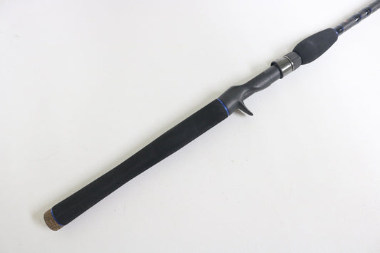 A close-up of the Dobyns Champion XP DC 795SB MT 7'9" Medium Heavy Used Casting Rod in excellent condition, featuring a black grip and trigger-style handle—ideal for buyers or participants in our used gear trade-in program.