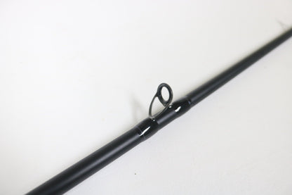A close-up of a Dobyns Champion XP DC 795SB MT 7'9" Medium Heavy Used Casting Rod in excellent condition, highlighting the line guide—ideal for those seeking quality Dobyns gear or interested in rod and reel trade-ins.