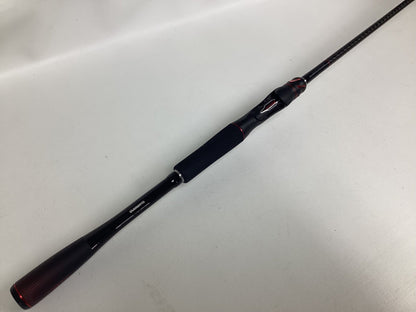 A Shimano Zodias ZDC72MLBFSA used casting rod in excellent condition, black with red accents and a foam handle, displayed diagonally on a plain white surface.