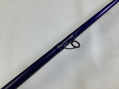 A close-up of a St. Croix Legend Tournament Musky Casting Rod Split Cork 8'3" Heavy Lipstick II in mint condition—ideal for anglers upgrading through our Rod and Reel Trade-In Program or earning store credit for used gear.