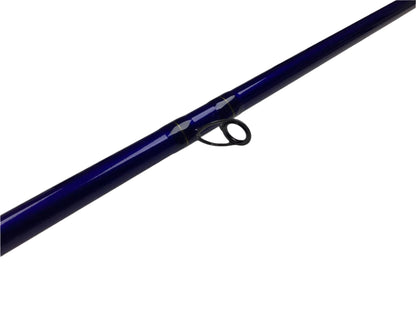 A close-up of a St. Croix Legend Tournament Musky Casting Rod Split Cork 8'6" Heavy Sling Blade, used in mint condition with a black guide loop, perfect for upgrades through our rod and reel trade-in program.
